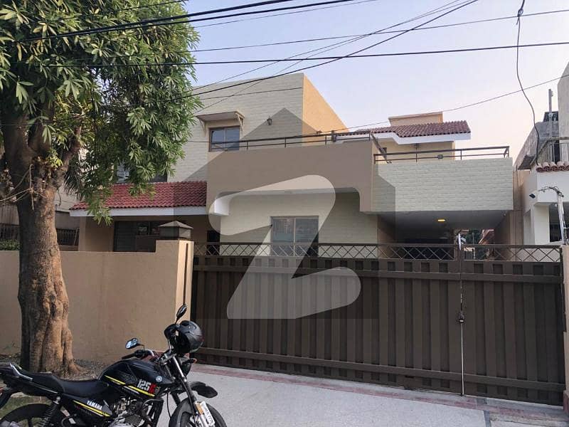 One Kanal Used Modern Design Bungalow For Sale At Prime Location Of DHA Lahore Near To Park & Commercial Market