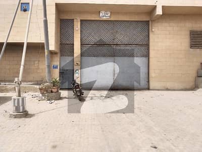 WAREHOUSE AVAILABLE ON RENT IN KORANGI INDUSTRIAL AREA ON MAIN ROAD LOCATION GOOD FOR STORAGE DISTRIBUTOR OPEN AREA