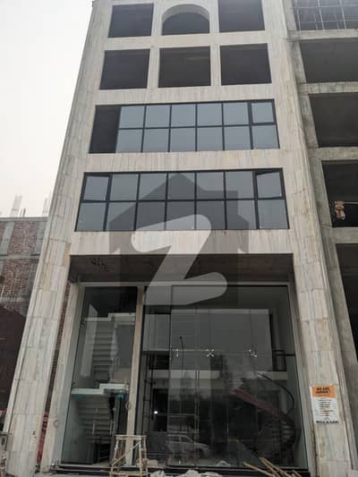 Facing Ring Road 8 Marla Building (Ground + Mezzanine) Available For Rent In Lake City.