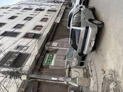 Shop For Rent with washroom Phase 2 Extension 13 Commercial