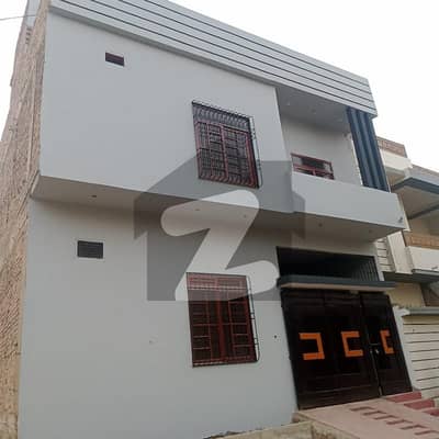 "Stylish 100 Sq. Yards Double-Storey Bungalow in Secure Gated Society"