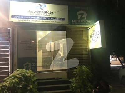 450 sq. Ft GROUND WITH 450sq. Ft BASEMENT SHOP AVAILABLE FOR RENT AT MUSLIM COMMERCIAL DHA PHASE 6 Furnished Unfurnished Both Options Available