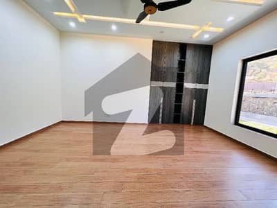 30 Marla Beautiful Designer House with Big Lawn.