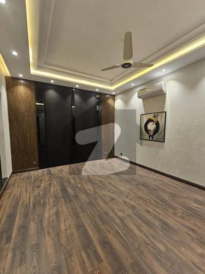 A Rare Opportunity To Own A Stunning 1-Kanal Brand-New Bungalow Complete With A Basement, 4 Spacious Bedrooms, 2 Kitchens, & Exquisite Finishes In DHA Phase 6, Block L A Rare Opportunity To Own A Stunning 1-Kanal Brand-New Bungalow Complete With A Basement, 4 Spacious Bedrooms, 2 Kitchens, & Exquisite Finishes In DHA Phase 6, Block L