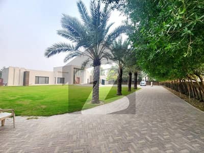 A Slice Of Paradise: 16-Kanal Swiss Farmhouse With Stunning Views, Large Pool, And Green Lawn On Bedian Road For Sale With Easy Deal Through EMPIRE Estate