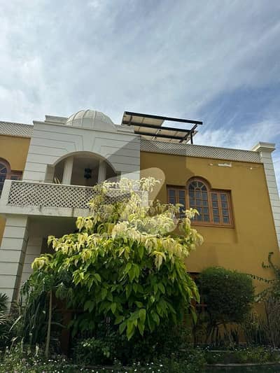 ڈی ایچ اے فیز 2 ایکسٹینشن ڈی ایچ اے ڈیفینس,کراچی میں 6 کمروں کا 2 کنال مکان 20.5 کروڑ میں برائے فروخت۔