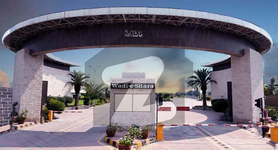 CORNER HOT LOCATION 26 MARLA PLOT FOR SALE IN EXECUTIVE SOCIETY WADIE SITARA MAIN SHEIKHUPURA ROAD