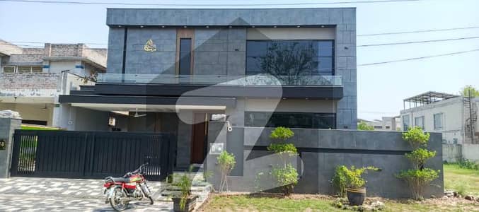 Charming 1-Kanal Modern House for Sale with 5 Attached Bathrooms, Elegant Kitchen, Lush Green Lawn & Ideal Location Facing 100 Road State Life Housing Society Phase 1 Charming 1-Kanal Modern House for Sale with 5 Attached Bathrooms, Elegant Kitchen, Lush Green Lawn & Ideal Location Facing 100 Road State Life Housing Society Phase 1