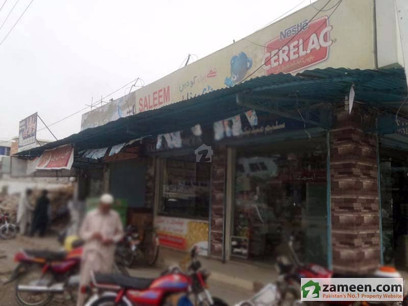 House With 7 Shops Available For Sale University Road, Sargodha