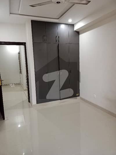 بی
