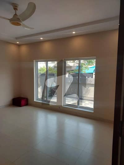 Discover A Rare Gem In The Heart Of DHA Phase 4 10-Marla Modern Brand New House