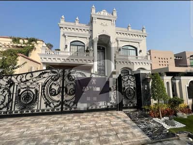 Spanish Classic 1-Kanal Bungalow with Basement, 5 Bed Attached Baths, 2 Kitchens, Servant Quarters & Lush Lawn for Sale in Prime DHA Phase 5 Elegant Living with Easy Access and Budget-Friendly Luxury! Spanish Classic 1-Kanal Bungalow with Basement, 5 Bed Attached Baths, 2 Kitchens, Servant Quarters & Lush Lawn for Sale in Prime DHA Phase 5 Elegant Living with Easy Access and Budget-Friendly Luxury!