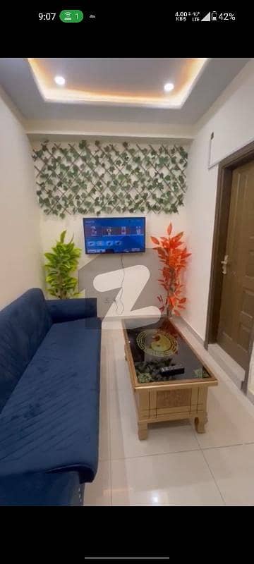 بی