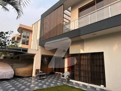 1 Kanal Elegant And Fully Maintained Super Hot Located Bungalow Is Available For Sale In The Best Block Of DHA Lahore. 1 Kanal Elegant And Fully Maintained Super Hot Located Bungalow Is Available For Sale In The Best Block Of DHA Lahore.