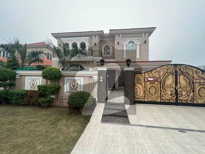 1 Kanal Elegant And Prime Location Super Hot Located Bungalow Is Available For Sale In The E Block Of DHA Phase 6 Lahore.