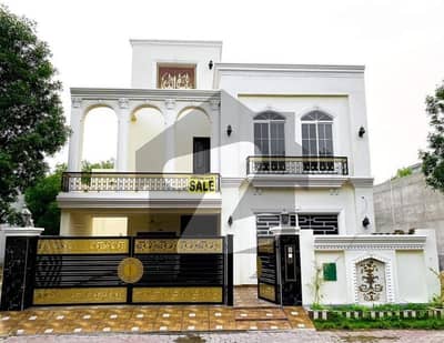 10 Marla barnd new house for sale in overseas A bahria Town Lahore good location A plus house visit anytime pic available