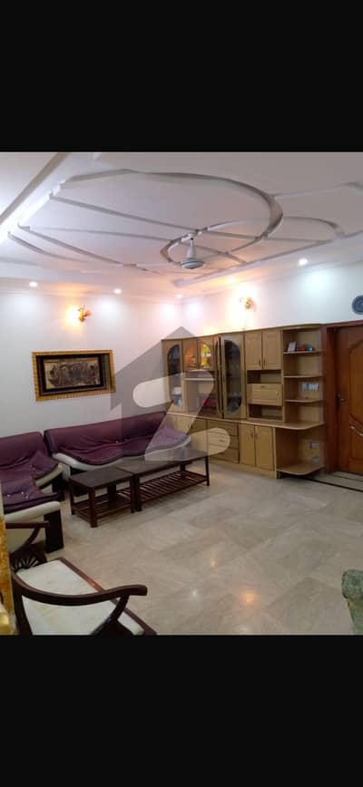 Wapda town 10 marla house 60 fit road exillent location
