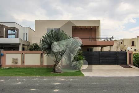 01 Kanal Most Elegant Slightly Used Fully Maintained Super Hot Located Bungalow Is Available For Sale In DHA Phase 4 Lahore. TOP LOCATION