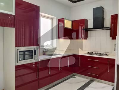 A Masterpiece in DHA Phase 6 Rent This 1-Kanal Upper Portion with Impressive Features, Spacious Rooms, and a Prime Street Presence