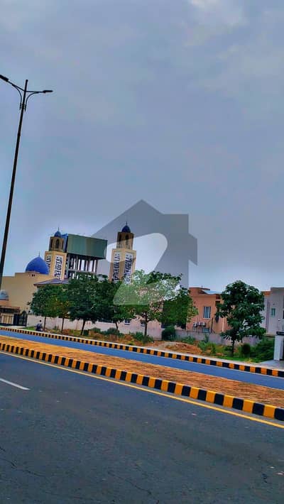 Last Golden Chance A 27 Marla Corner Plot On Main Road Surrounding Houses Available For Sale In DHA Phase 8 Very Close Ring Road And Airport