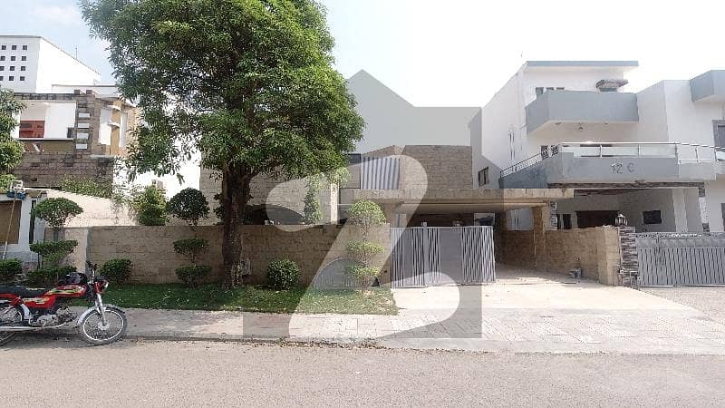 Visually Striking 1 Kanal House For Sale At DHA Phase 2 - Sector C Islamabad Visually Striking 1 Kanal House For Sale At DHA Phase 2 - Sector C Islamabad