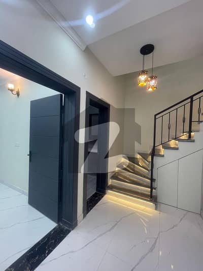 5 Marla Beautiful Brand New Modern Design House Available For Sale.   just 1 Mint Drive From the Main Gate!!