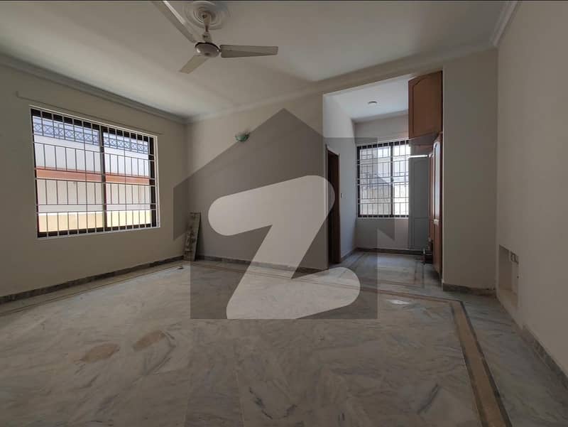 Spacious 4-Bedroom Ground Portion with Lawn & Separate Gate in F-11