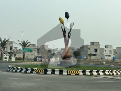 IN GROUND 10 MARLA PLOT WITH POSSESSION AND UTILITY CHARGES PAID AVAILABLE FOR SALE