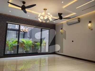 Investors Jackpot! Secure This 1-Kanal Ultra-Spacious Bungalow with Basement, 5 Attached Baths, and Dual Company Kitchens in Prime DHA Phase 6 at the Lowest Market Price A Fresh Listing by Wall Green Realtors