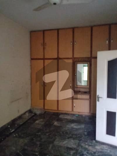 House Spread Over 10 Marla In PIA Housing Scheme Available