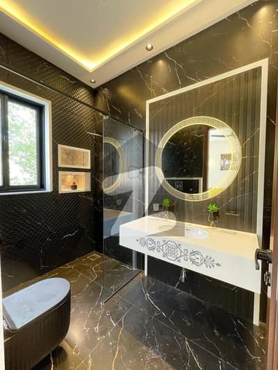 8 Marla Beautiful Brand New House Available For Sale  Beautiful Front Elevation with tiles work done!!