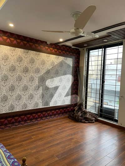 10 Marla Tile Floor House Is For Rent In Wapda Town Block F2.