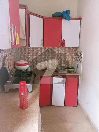 Single room available for in Aman tower rent 14000 main korangi crossing