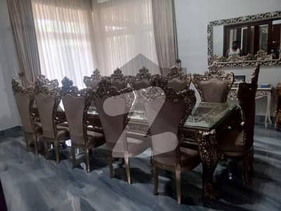 Wedding & Event Paradise 7-Kanal Solar-Equipped, Fully Furnished Farmhouse with Lush Green Lawn, Double Designer Kitchen, Drawing & Dining, Huge Parking Ideal Location at BRB Canal Road Near DHA Phase 7, Per Day
