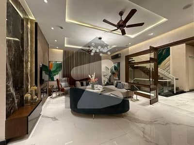 A PRIME LOCATION 2 KANAL BRAND NEW HOUSE FOR SALE IN SHAHEEN BLOCK SECTOR B BAHRIA TOWN LAHORE