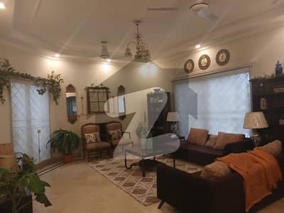 Fully Furnished with Separate Entrance Elegant 1-Kanal Upper Portion for Rent in DHA Phase 4 Featuring 3 Luxury Bedrooms, Drawing & Dining, Modern Kitchen, and Prestigious Location by Wall Green Realtors