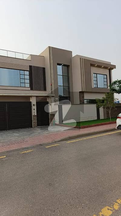 A stunning, Fully Furnished 1000 sq yd luxury villa in Precinct 7, Bahria Town Karachi. This double-heighted villa features 7 spacious rooms, a swimming pool, lift, designer kitchen.
