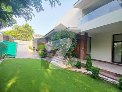 2 Kanal Lash Green Lawn + 2 Kanal Slightly Used Modern Design Most Beautiful Fully Furnished Bungalow For Sale At Prime Location Of DHA Lahore Near To Park Masjid & Commercial Market.