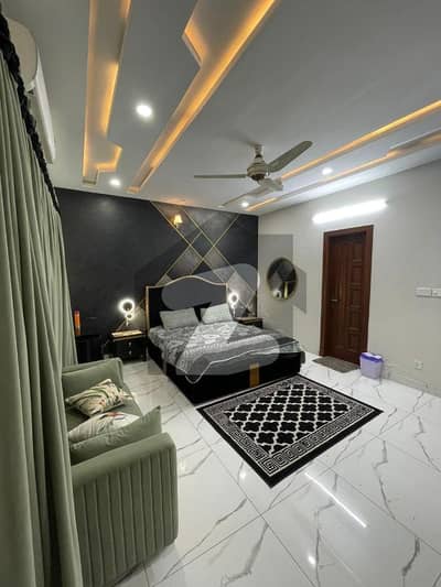 2 Bed ON DAILY AND MONTHLY BASIS Furnished Rooms Available. For Rent Faisal Town F-18 Islamabad.
