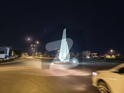 1 Kanal Plot On investor price Mian Avenue Road Sector B DHA Phase 5 Islamabad