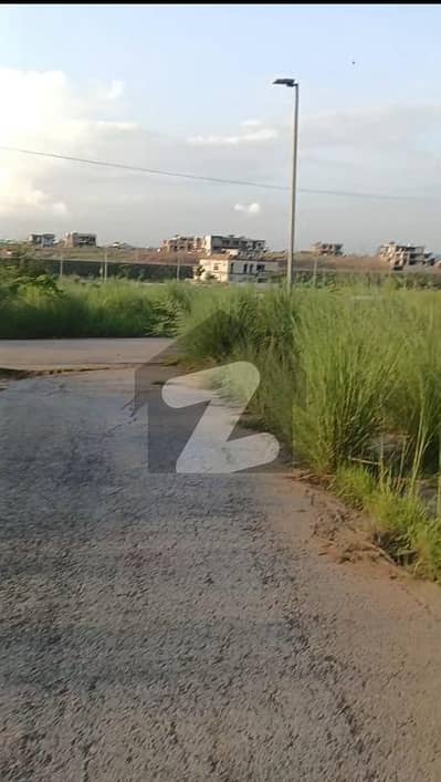 Investor Rate, Develop, Level Possession able One Kanal Plot For Sale in Sector C, DHA 5, Islamabad