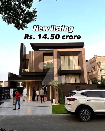 One Kanal Brand New Luxury Ultra-Modern Design Most Beautiful Fully Furnished Bungalow 2 Servant Quarter In Basement For Sale At Prime Location Of DHA Lahore Near To Park Masjid & Commercial Market.
