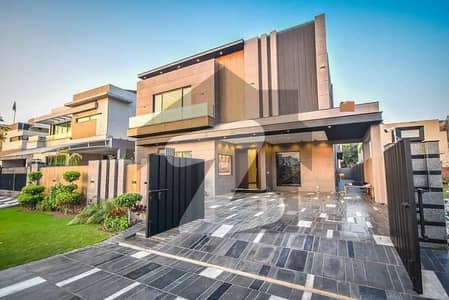 One Kanal Slightly Luxury Ultra-Modern Design Most Beautiful Bungalow 2 Servant Quarter In Basement For Rent At Prime Location Of DHA Lahore Near To Park & Commercial Market.