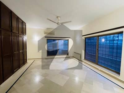 Spacious 5-Bed, 6-Bath House in F-8 with Green Lawn & Parking