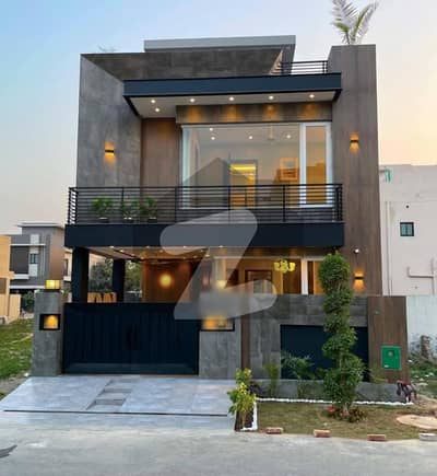 Charming 5-Marla House For Sale Near Park In DHA Phase 9-Town Exclusive Living With 3 Beds, Modern Kitchen & Spacious Living Area Easy Deal With Wall Green Realtors