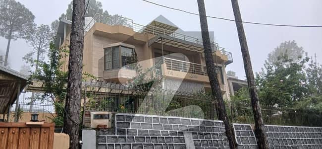 مری ایکسپریس وے مری میں 7 کمروں کا 1 کنال مکان 6.5 کروڑ میں برائے فروخت۔