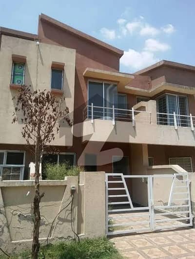 5.25 Marla house facing park is avalabel in Eden Garden with reasonable price.