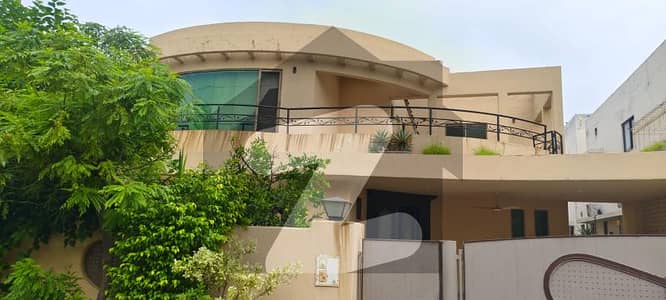 1 Kanal Spacious Family Bungalow for Sale DHA Phase 4 | Ideal Location | Reasonable Demand