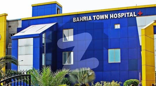 6 Marla two side open sector c commercial A side plot for sale near to grand mosque 40 feet parking +50 feet road main commercial hub Bahria Town Lahore