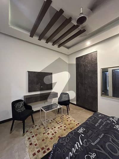 Dha Defence "Luxury 2-Bedroom Fully Furnished Portion for Rent in DHA Phase 8 - VIP Posh Location, Large Swimming Pool, and Modern Amenities in a Secure and Prime Area"